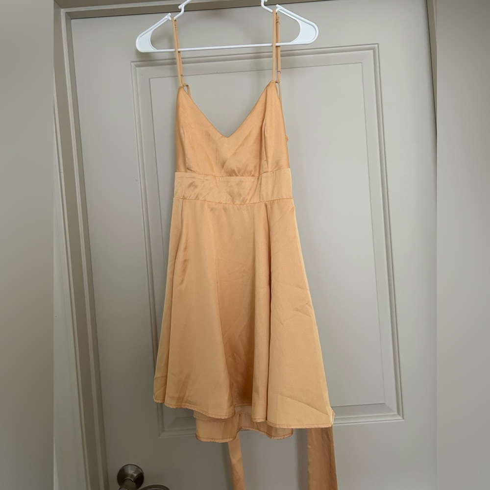 Mango color adjustable tie back mini dress!